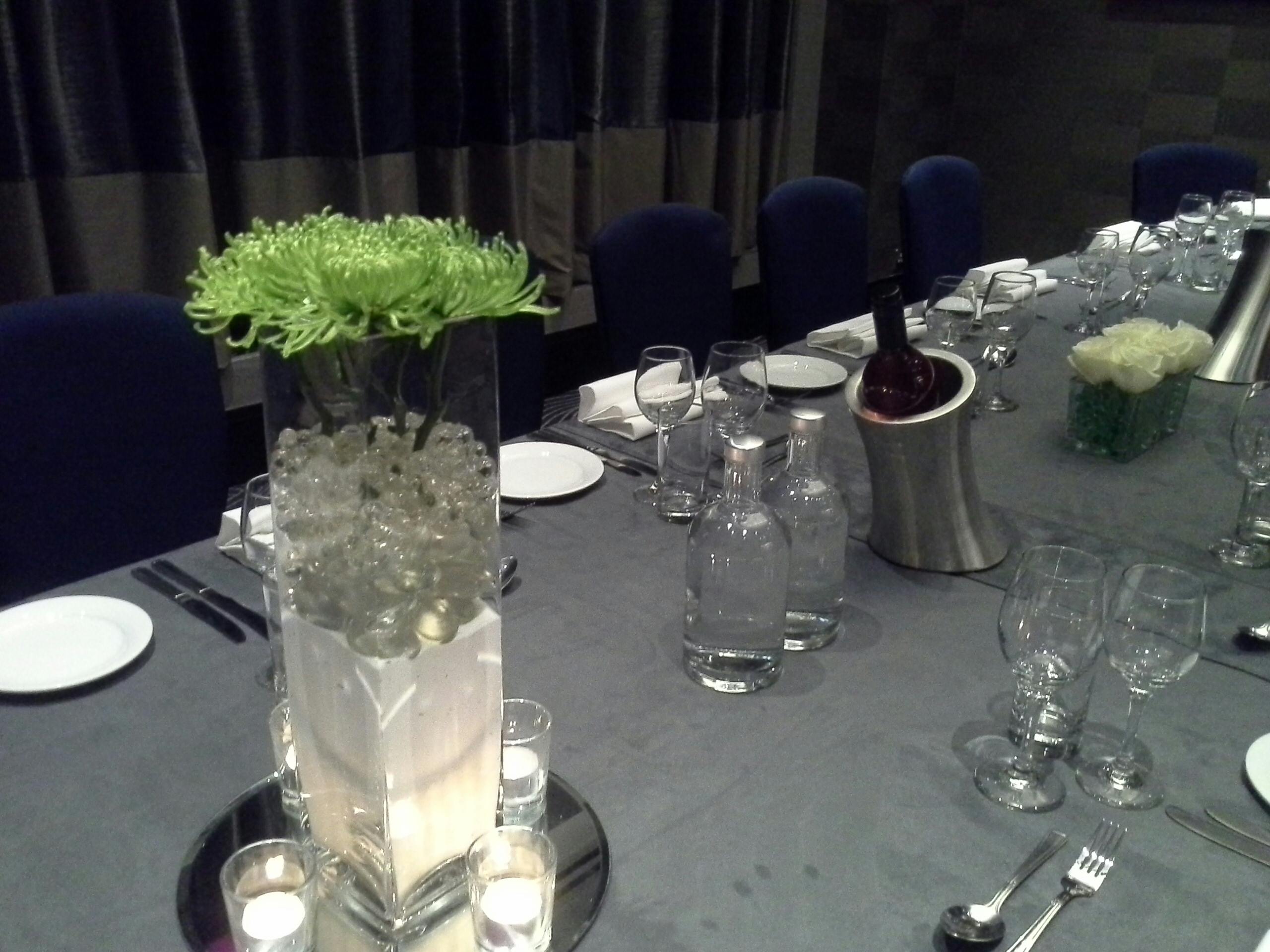 Elegant dining table setup for a corporate dinner at The National, DoubleTree by Hilton.